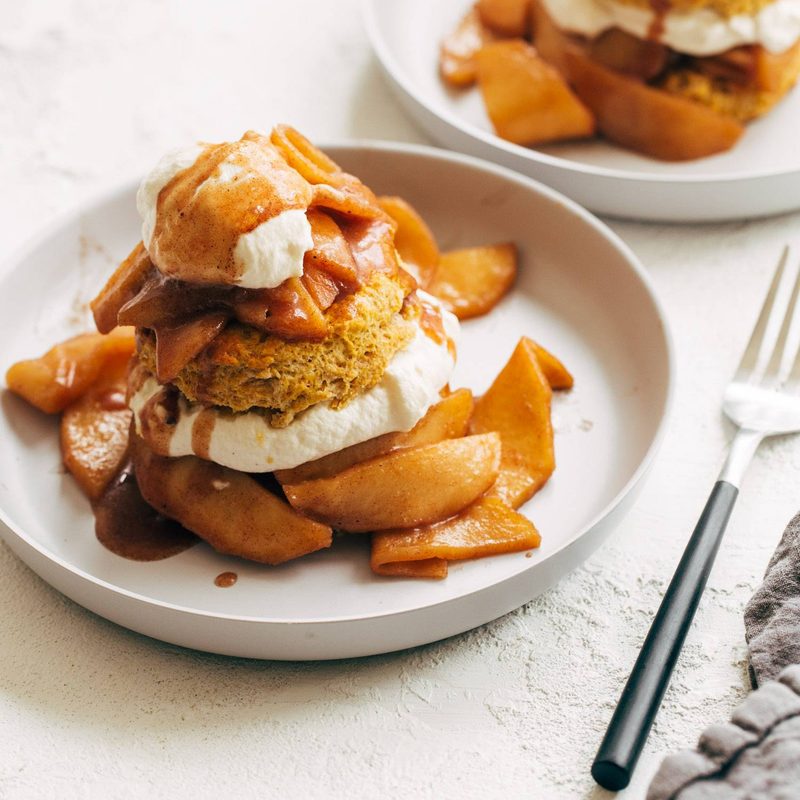 Pumpkin shortcakes on plates.