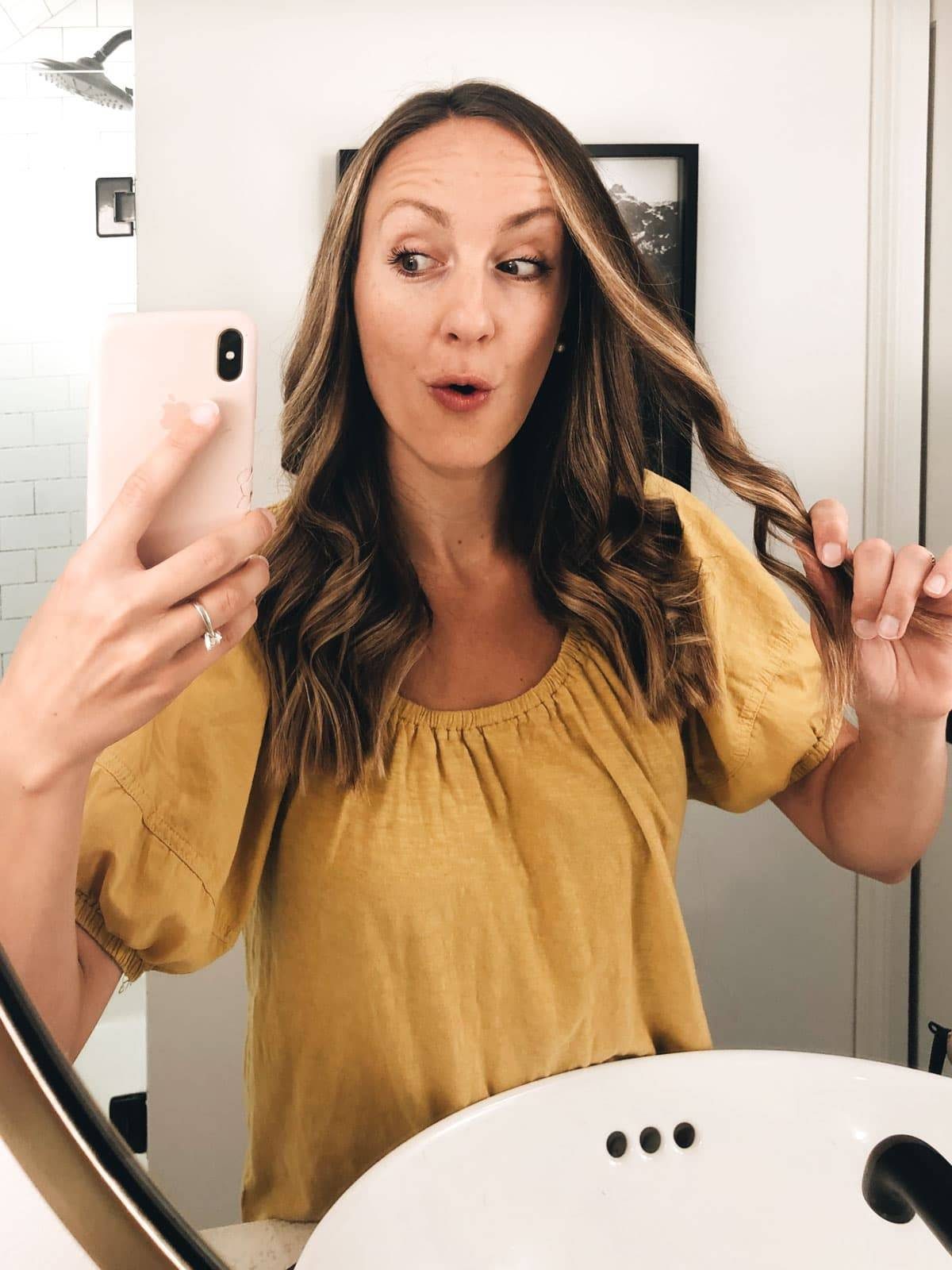 Lindsay with curled hair.