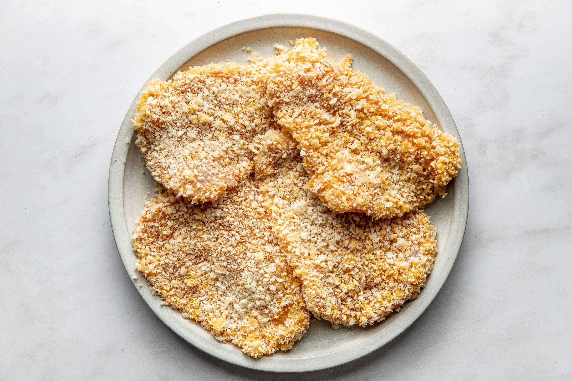 Chicken covered in breading.