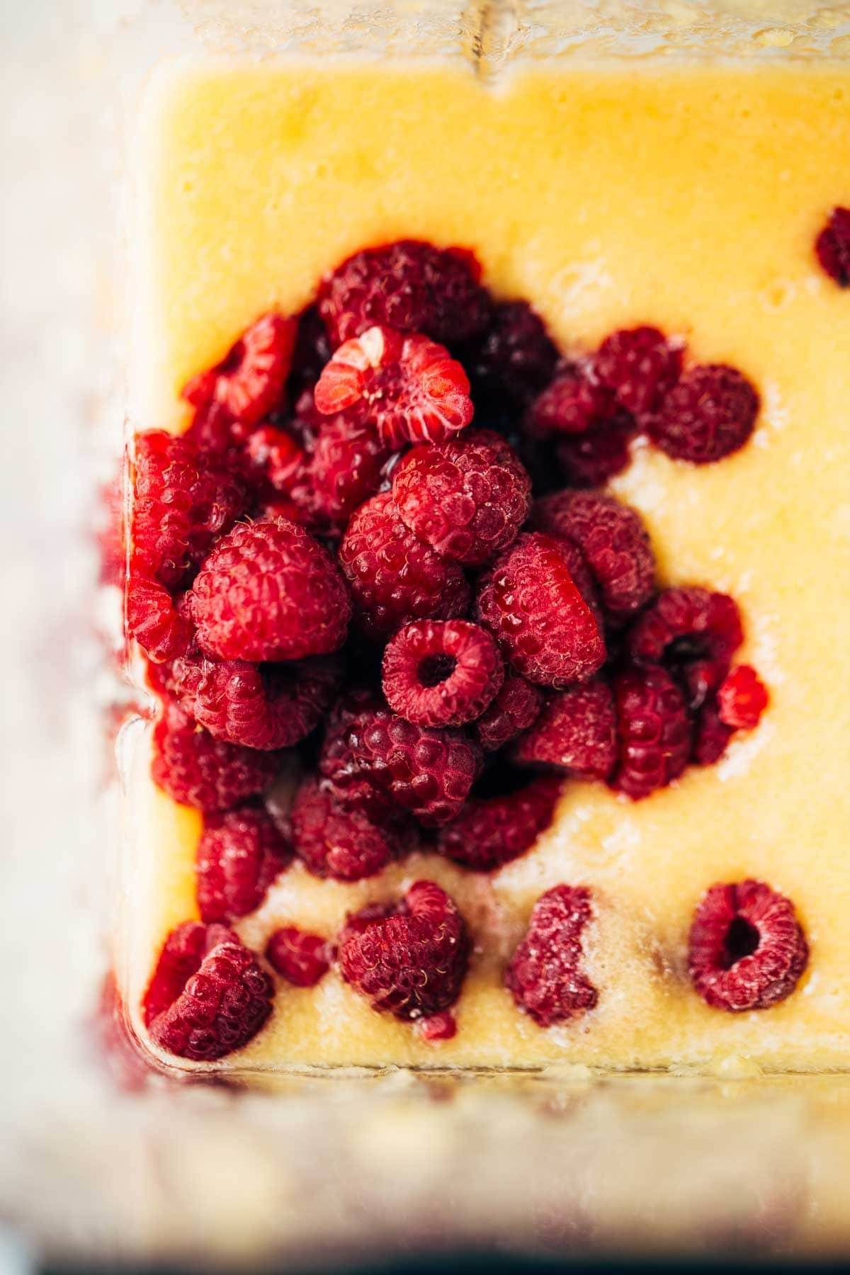 Raspberries in a blender.